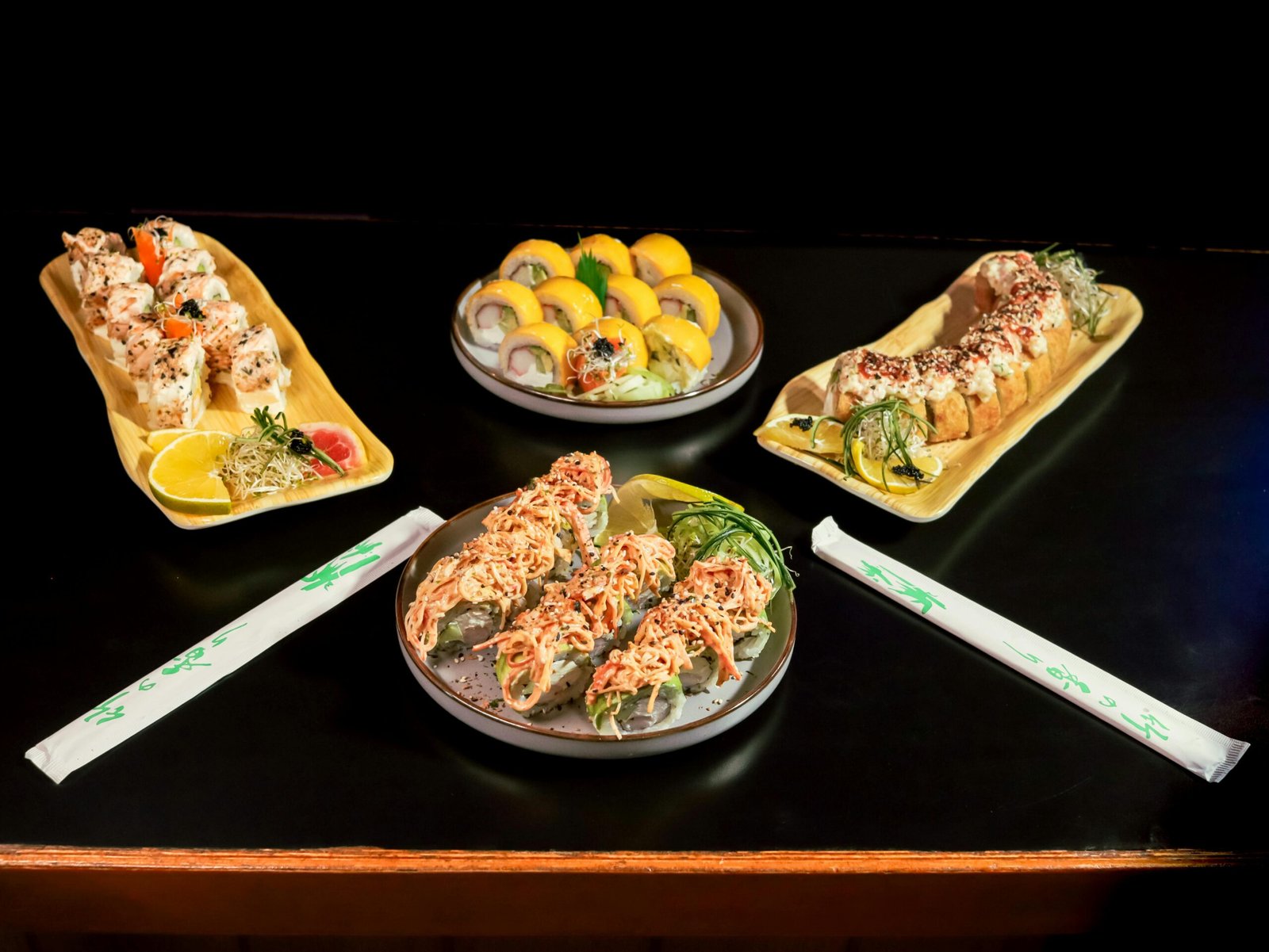 A vibrant sushi platter featuring assorted rolls with colorful presentation.